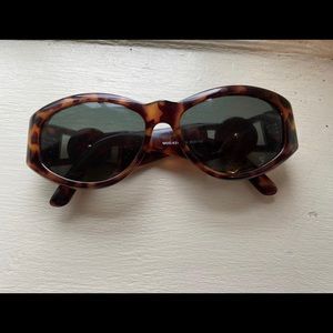 Versace (424-869) sunglasses. Vintage tortoise colorway and in great condition!